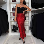 High-waist sequined midi skirt in red, fitted with elastic waistband and front slit