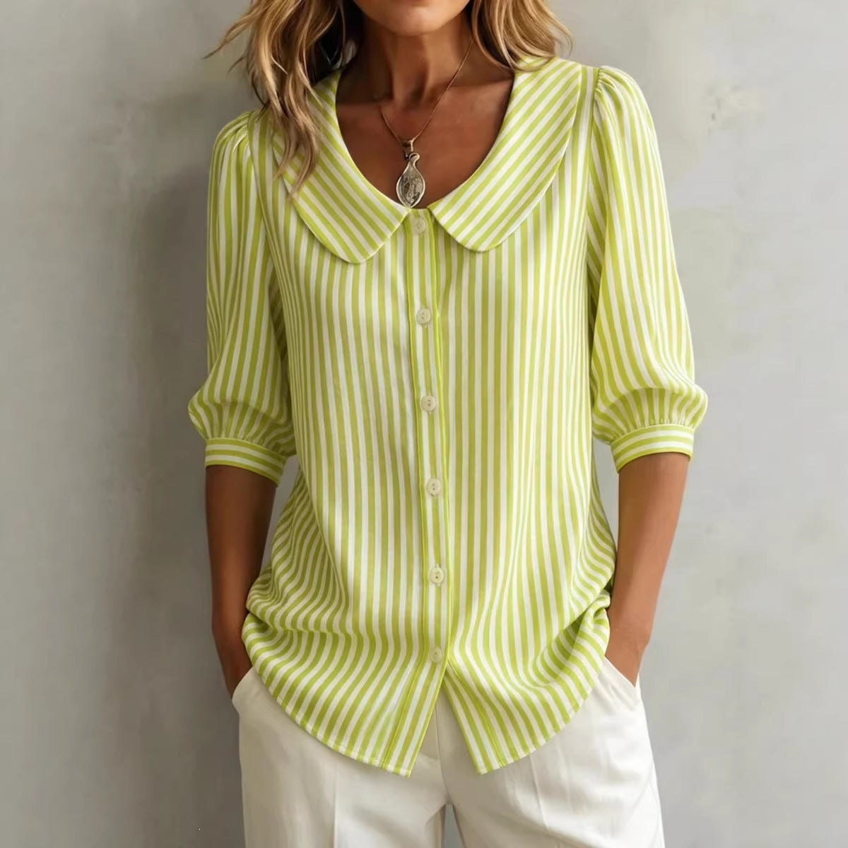 Light green and white striped V-neck mid-sleeve button top with front placket
