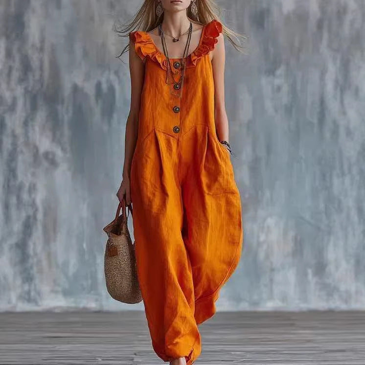 Orange-red sleeveless button-down jumpsuit with ruffled shoulder details and side pockets