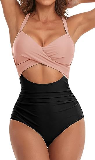 Women's cross one-piece swimsuit in blush pink and black with midriff cutout