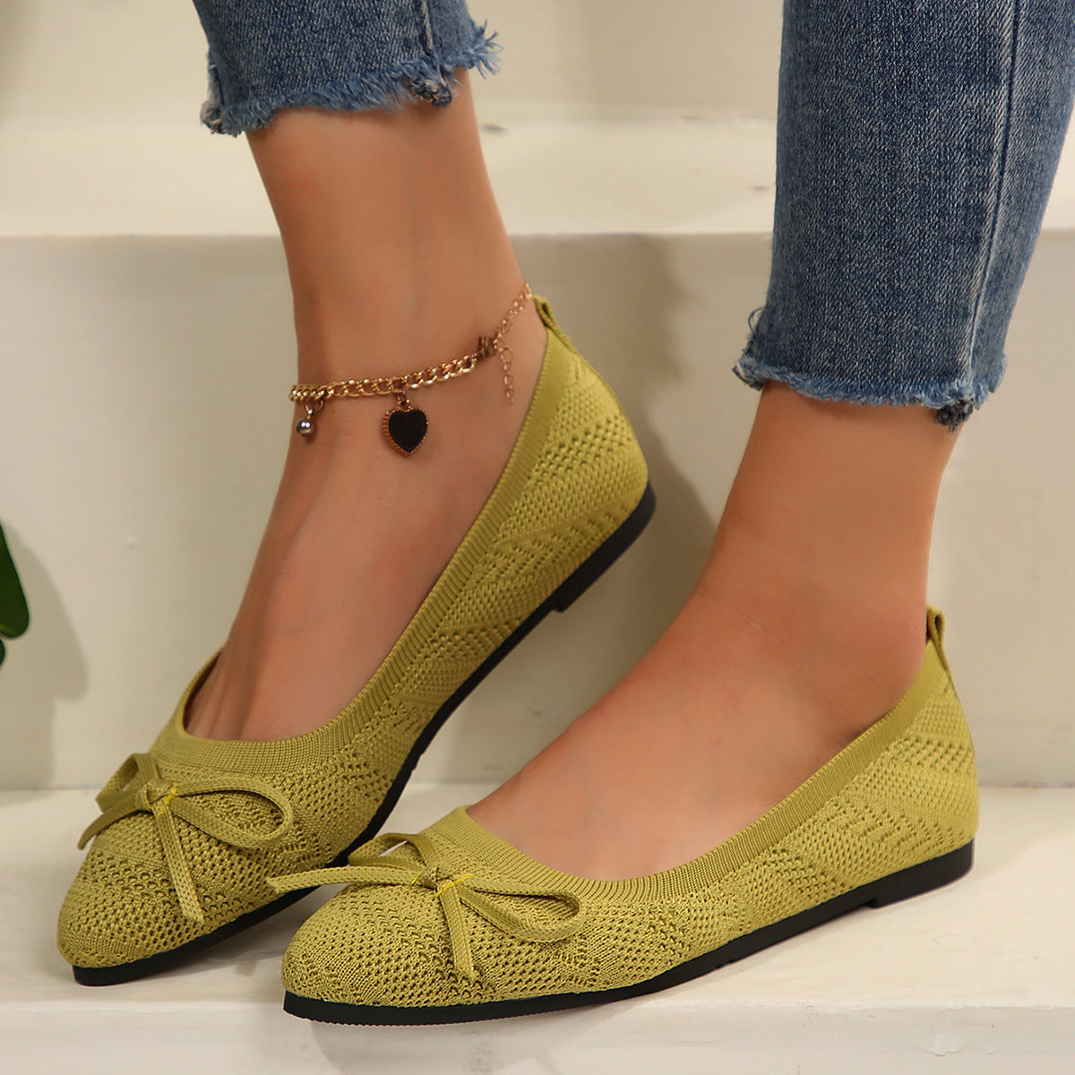 Matcha knit pointed-toe loafers with bow and gold beaded ankle chain