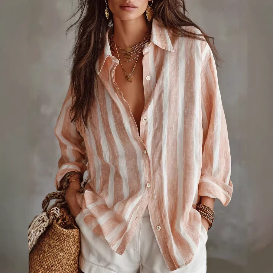 Striped oversized button-up shirt in pink and white, long sleeves, front button placket