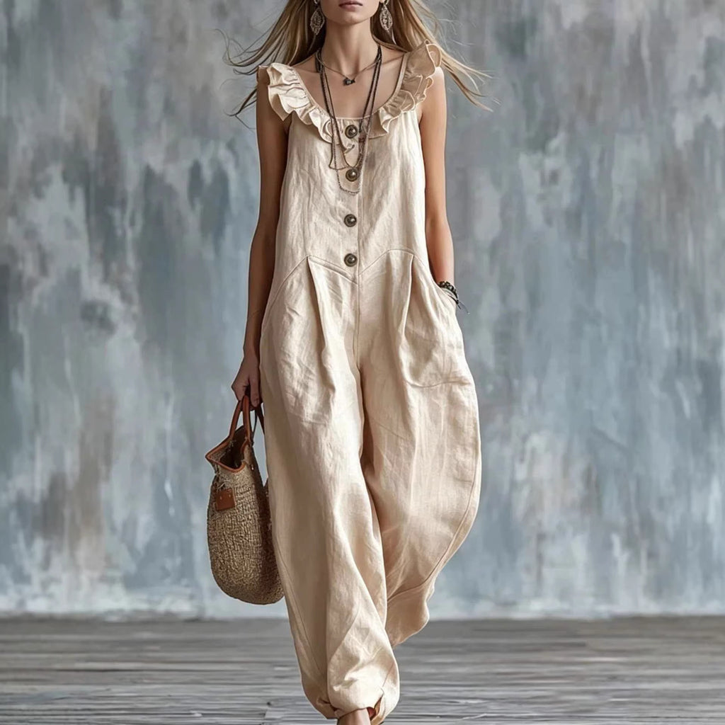 Light apricot sleeveless button-down jumpsuit with ruffled neckline and front buttons
