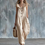 Light apricot sleeveless button-down jumpsuit with ruffled neckline and front buttons