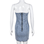 Backless light blue denim mini dress on mannequin with center back seam detail