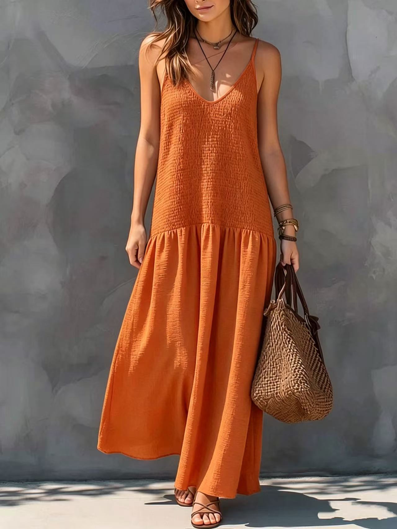 Orange red tiered maxi sundress with V-neck spaghetti straps and flowing skirt