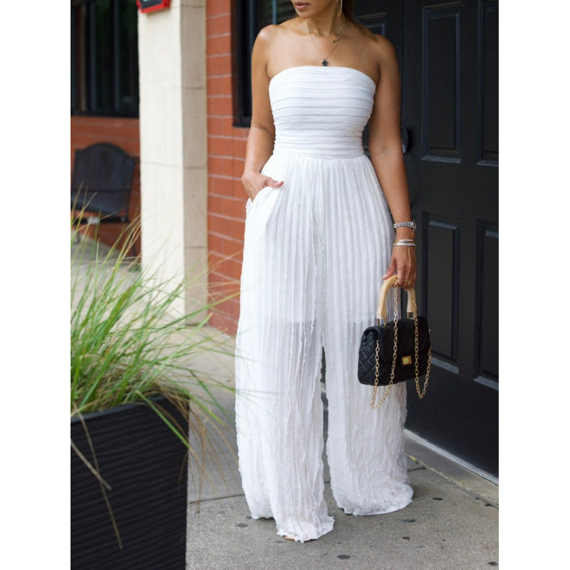 White strapless wide-leg jumpsuit with gathered bodice and textured pleated fabric
