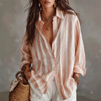 Oversized button-up shirt, pink and white vertical stripes, relaxed collar, front buttons