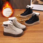 Set of beige and black lace-up ankle snow boots with sherpa trim and chunky soles