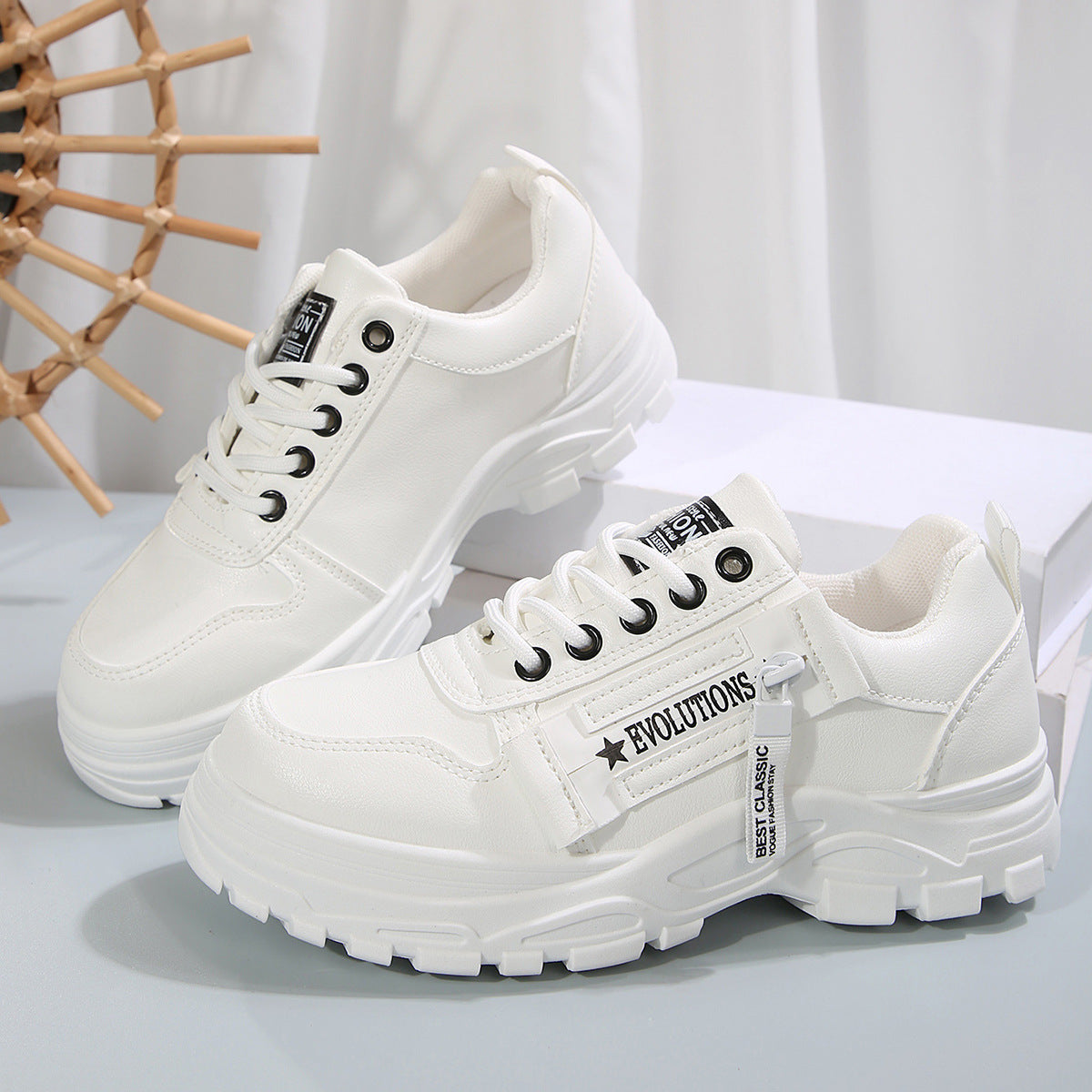 White lace-up chunky-sole sneakers with side logo strap and cushioned collar