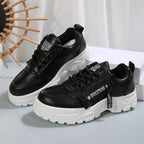 Black lace-up chunky-sole sneakers with side logo strap and white outsole