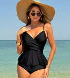 Black one-piece swimsuit with V-neck, ruched wrap detail, and peplum hem