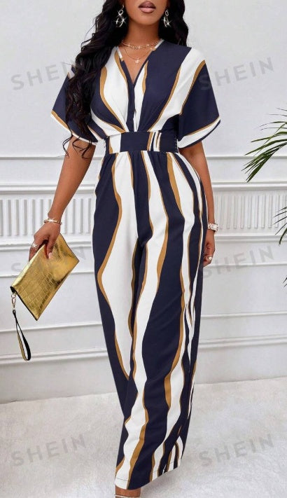 Batwing-sleeve V-neck jumpsuit in navy and white abstract stripes, waist tie