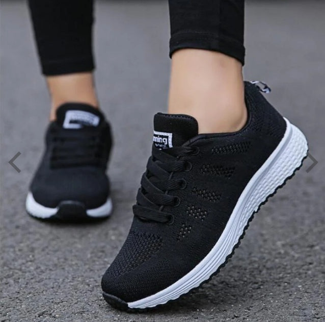 Black knit lace-up sports sneakers with white tread sole