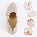 Light beige suede-look ankle boot close-up with side zipper and tassel pull