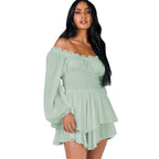 Light green off-shoulder ruffle jumpsuit with long sleeves and layered skirt tiers
