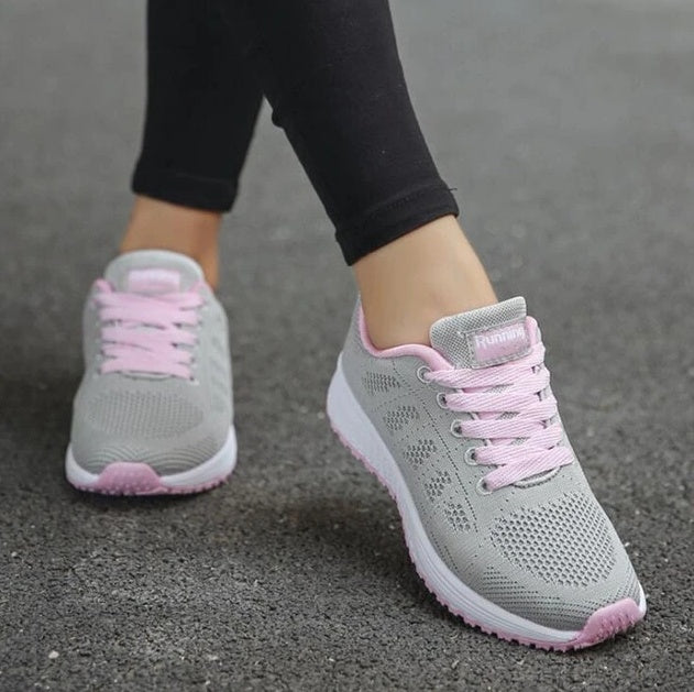 Light grey knit lace-up sports sneakers with pink laces and pink-trim sole
