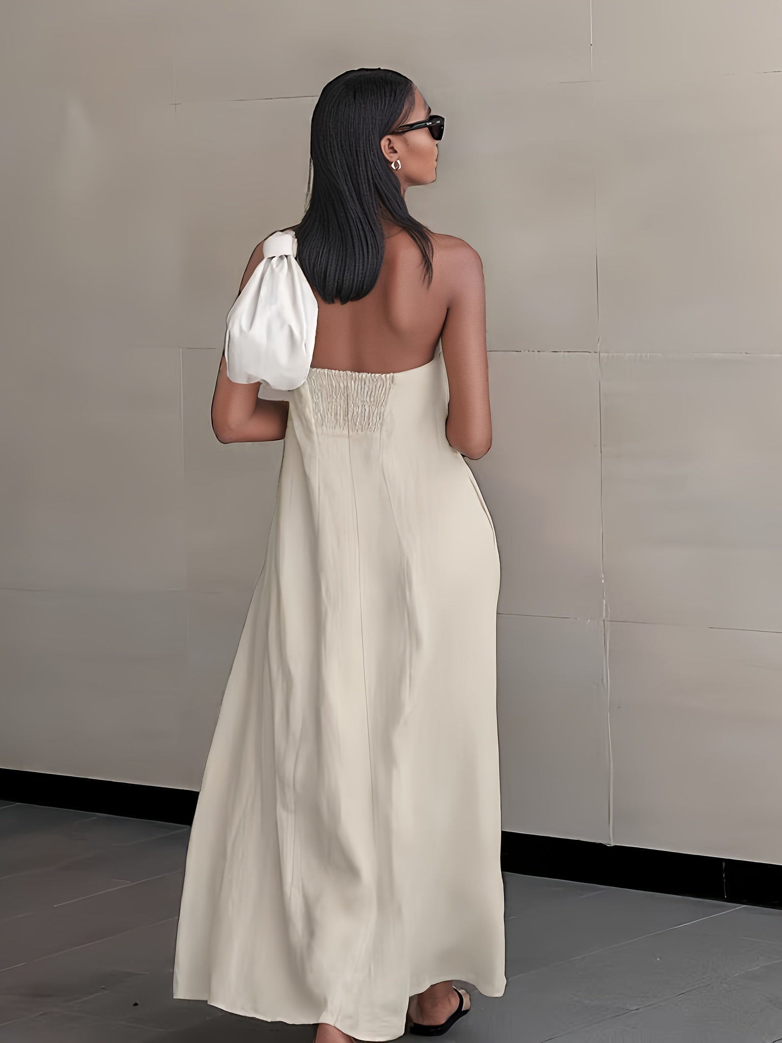 Backless strapless linen maxi dress in light cream with gathered back and tie