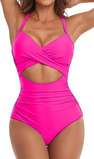 Women's cross one-piece swimsuit in bright pink with cutout waist