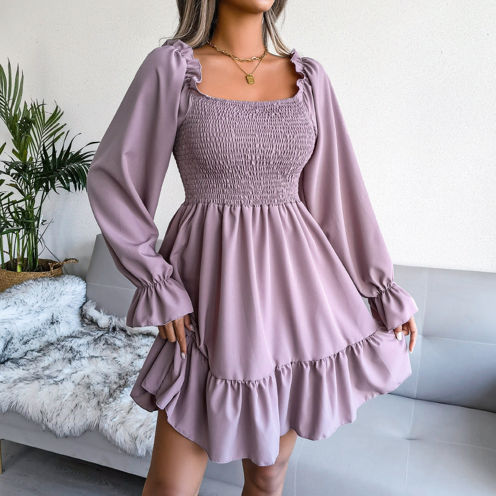 Lavender square-neck ruffle swing dress with long puff sleeves and tiered hem.