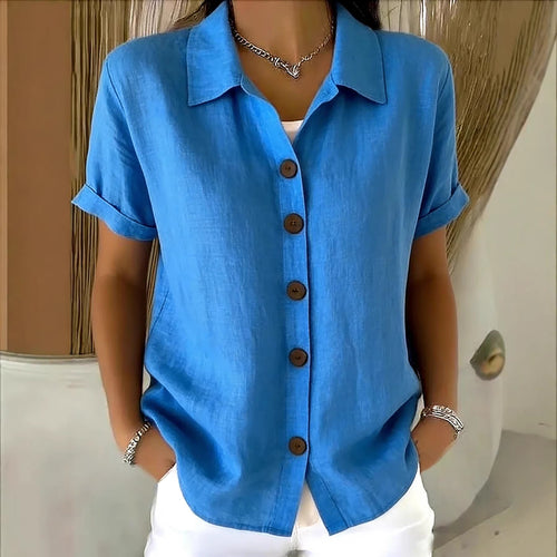 Button-down short-sleeve shirt in bright blue with button front and point collar