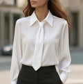 White long-sleeve tie-front shirt with point collar and tied neckline