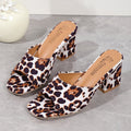 Leopard print heeled mules with square toe and block heel, tan base