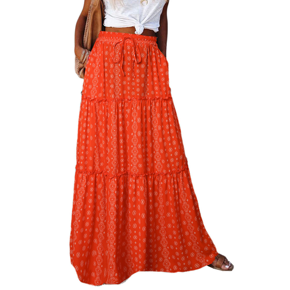 Tiered maxi dress with high waist and orange paisley print