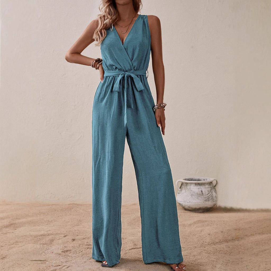 Blue-green high-waist sleeveless jumpsuit with V-neck, tie waist, and wide legs