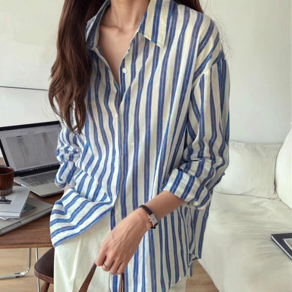 Blue and white striped long-sleeve button-up shirt, front view with buttoned placket