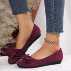 Burgundy suede bow comfort loafers with low heel and rubber tread sole