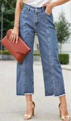 Blue high-waist wide-leg jeans with contrast seam stitching and frayed hem, front view.