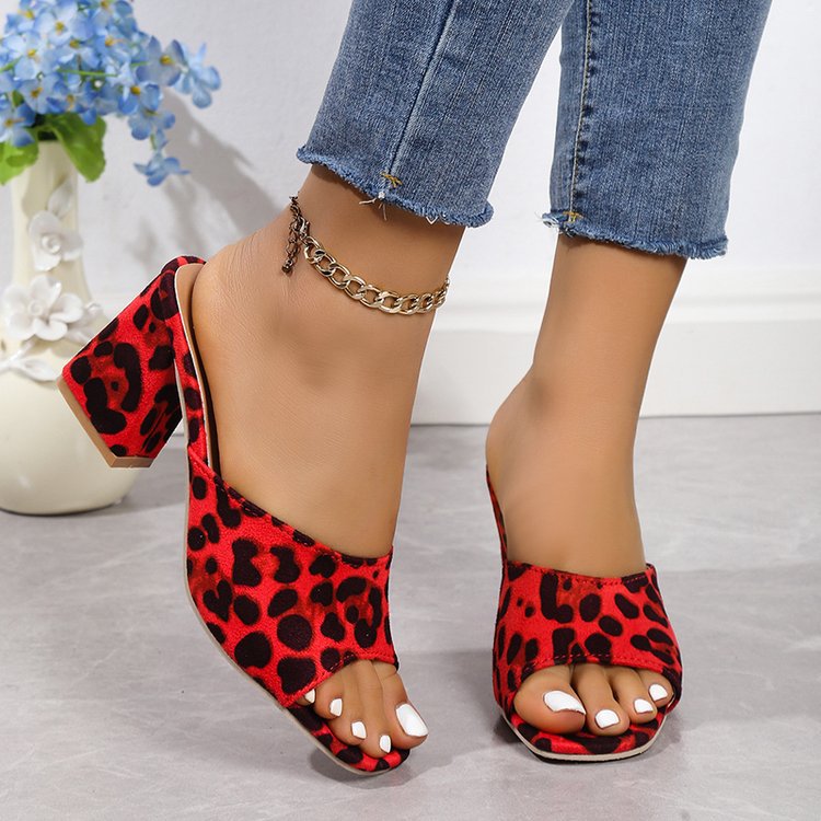 Red leopard print heeled sandals with square toe and block heel, ankle chain strap