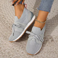Light grey breathable mesh wedge walking shoes with lace-up front and cushioned lining
