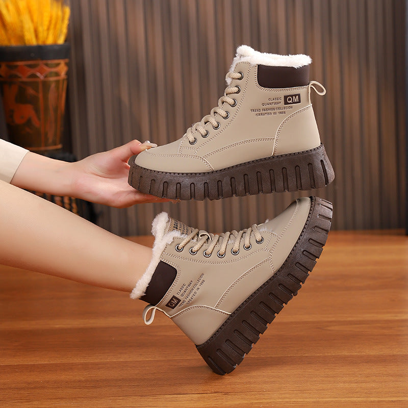 Light khaki lace-up ankle snow boots with sherpa collar and rugged platform tread