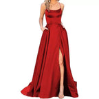 Wine red sleeveless maxi dress with square neckline, fitted bodice, and front slit