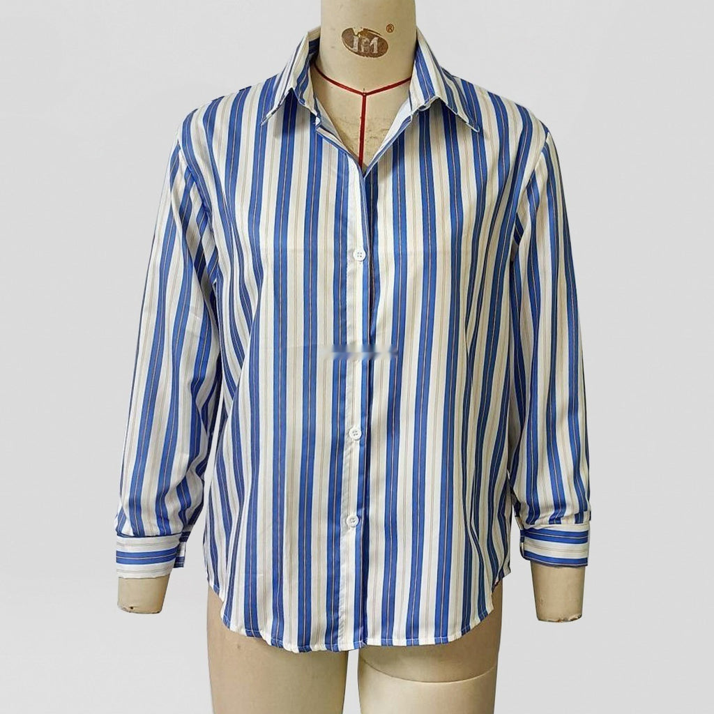 Blue and white striped long-sleeve button-up shirt on mannequin, collared with button placket
