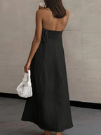 Backless strapless linen maxi dress in dark tone, with subtle patchwork seams