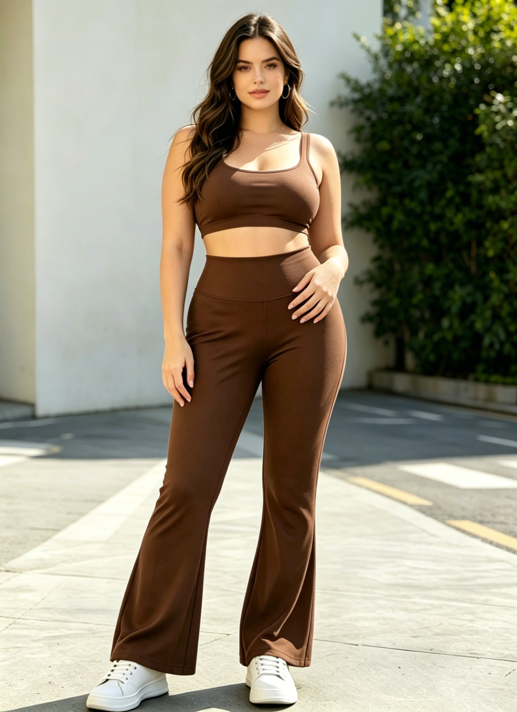 Coffee-brown high-waisted flared pants with elastic waistband, wide-leg floor length.