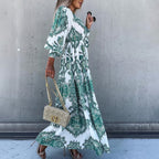 Women's Bohemian Flowy Maxi Dress - Charming V-Neck With Bell Sleeves, Bold Printed Pattern, Side Slit Design