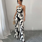 Zebra-print suspender jumpsuit, halter neckline, tie waist, wide-leg pants