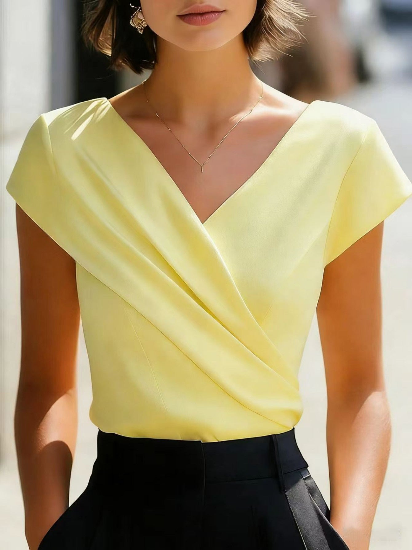 Yellow slim-fit V-neck t-shirt with short sleeves and diagonal wrap front