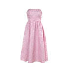 Pink satin jacquard tube top dress with strapless neckline and gathered skirt.