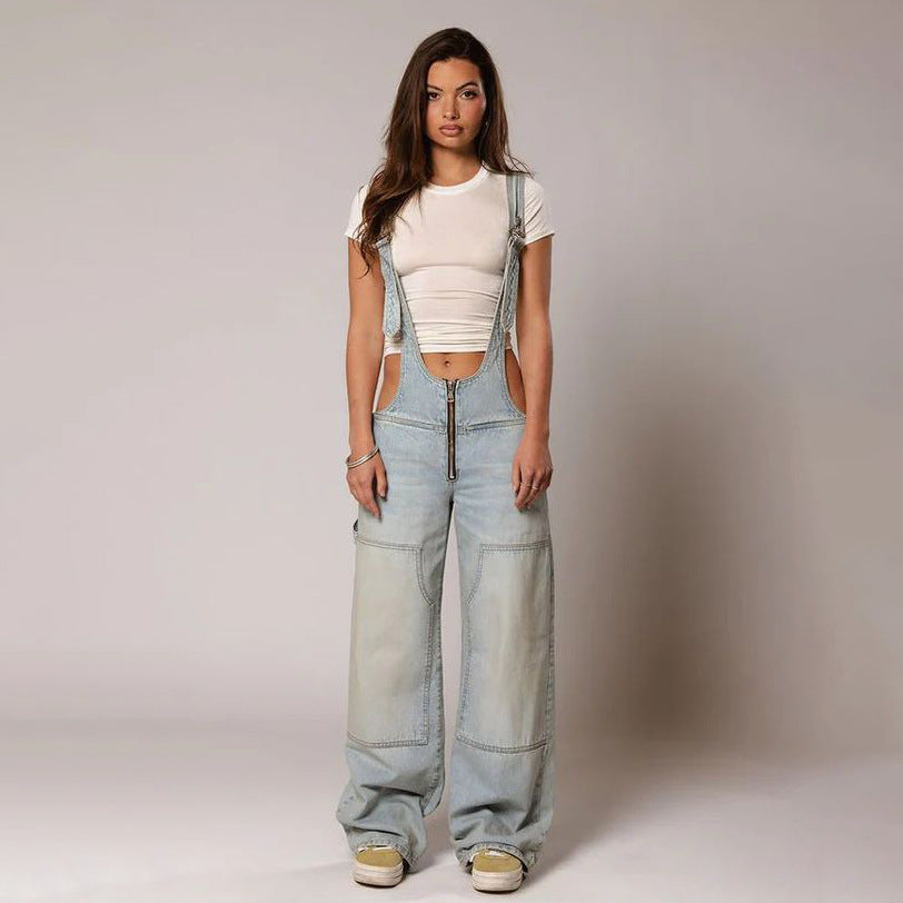 Light wash denim overalls with zip front, adjustable straps, and chest pockets