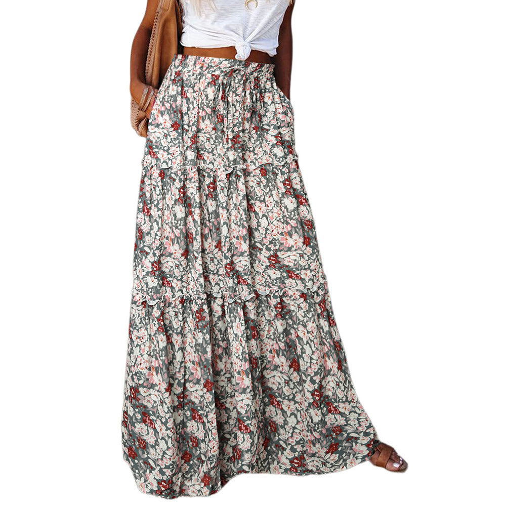 Tiered maxi dress with high waist and floral print in red, green, and white