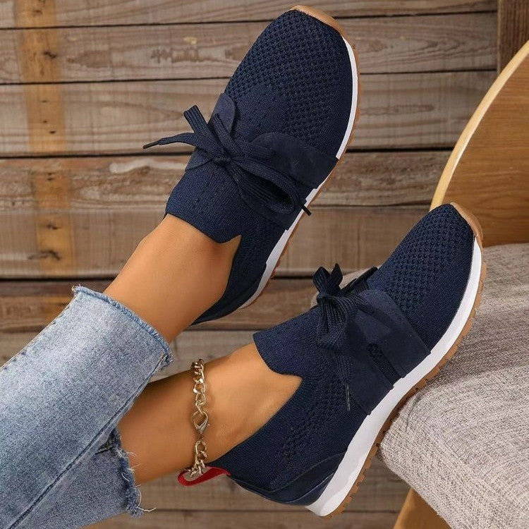 Dark blue breathable mesh wedge walking shoes with lace-up bow and white sole