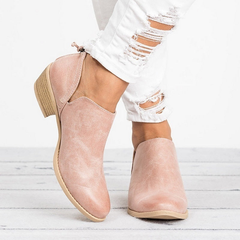 Pink suede-look ankle boots with side zipper and block heel