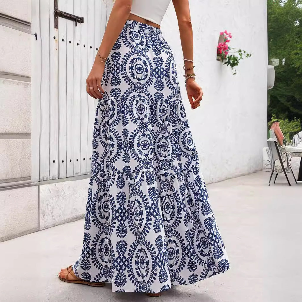 Blue patterned maxi swing skirt with circular swirl motifs and flowing flare