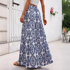 Blue patterned maxi swing skirt with circular swirl motifs and flowing flare