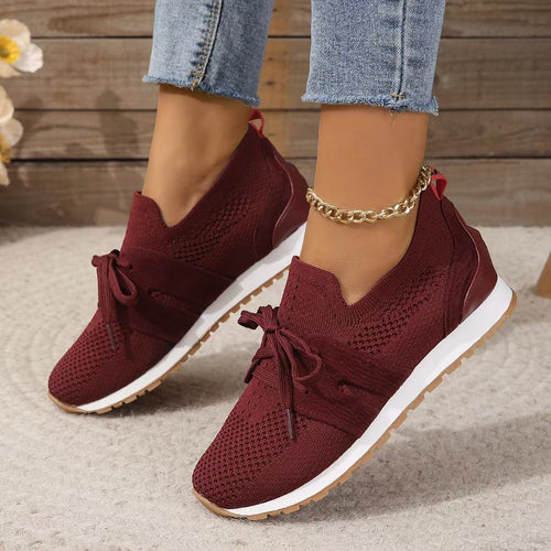 Red breathable mesh wedge walking shoes with lace-up bow and white rubber sole